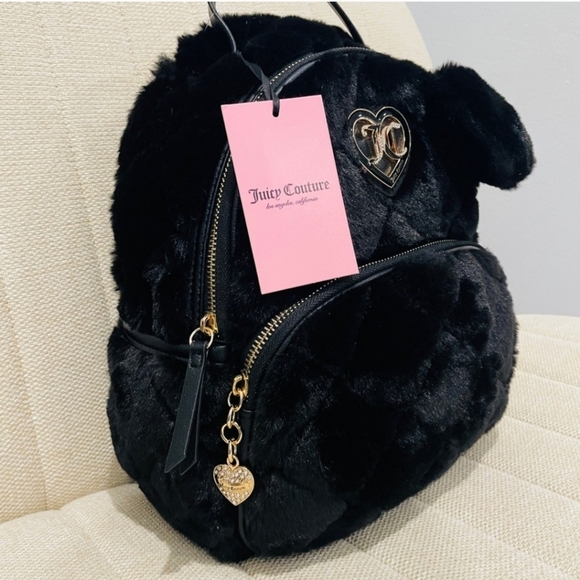 Juicy Couture Handbags - ❎️‼️SALE‼️❎️  🖤Juicy Couture, let's get  cozy black Furry Liquorice Backpack 🖤